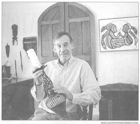 Michael Liepner, who runs estate and content sales in people's homes, displays some of his own finds, including an elaborate candlestick and the heavy oak doors.
